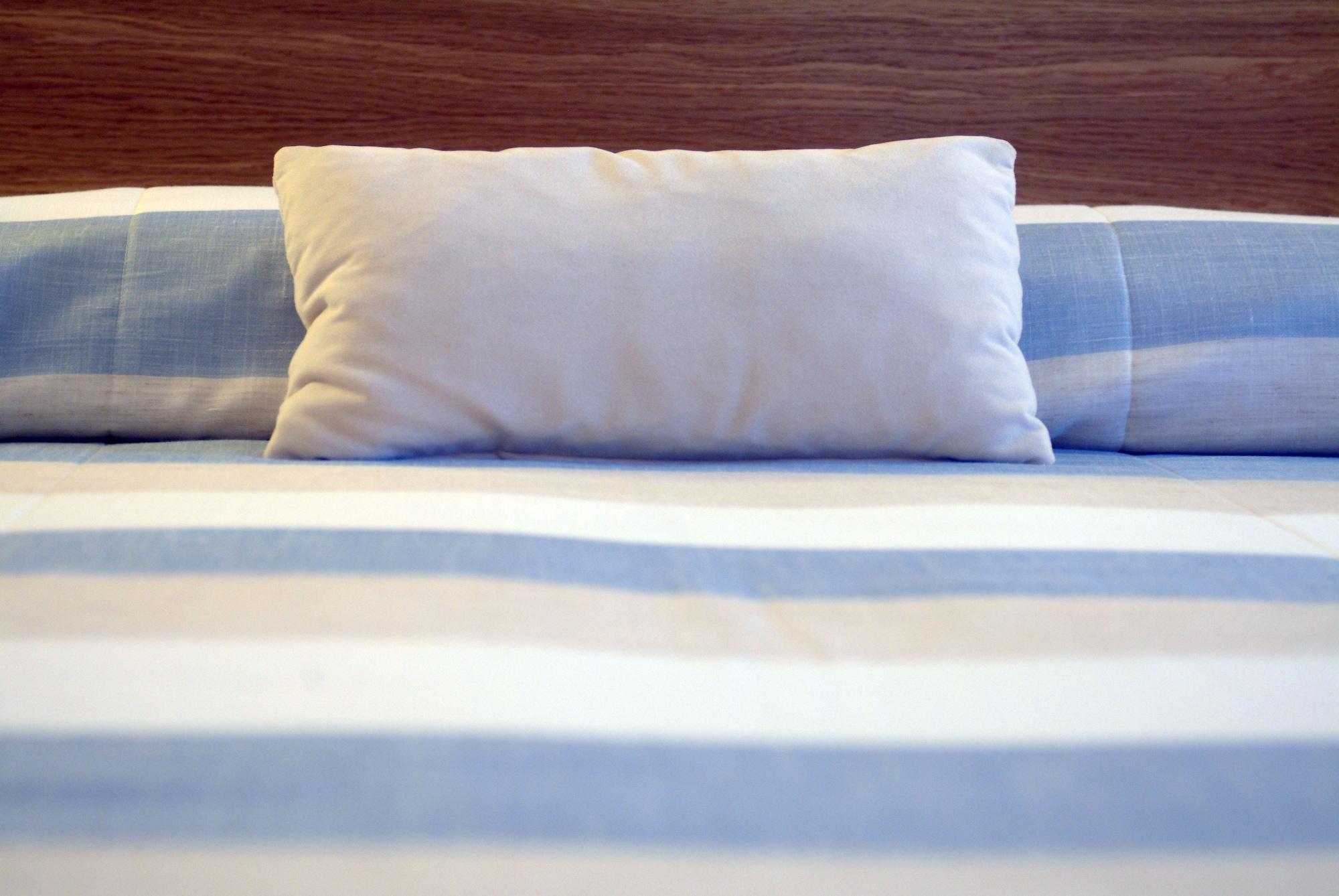 Pestana Casino Park Hotel&Casino Funchal  Bagian luar foto A pillow on a bed